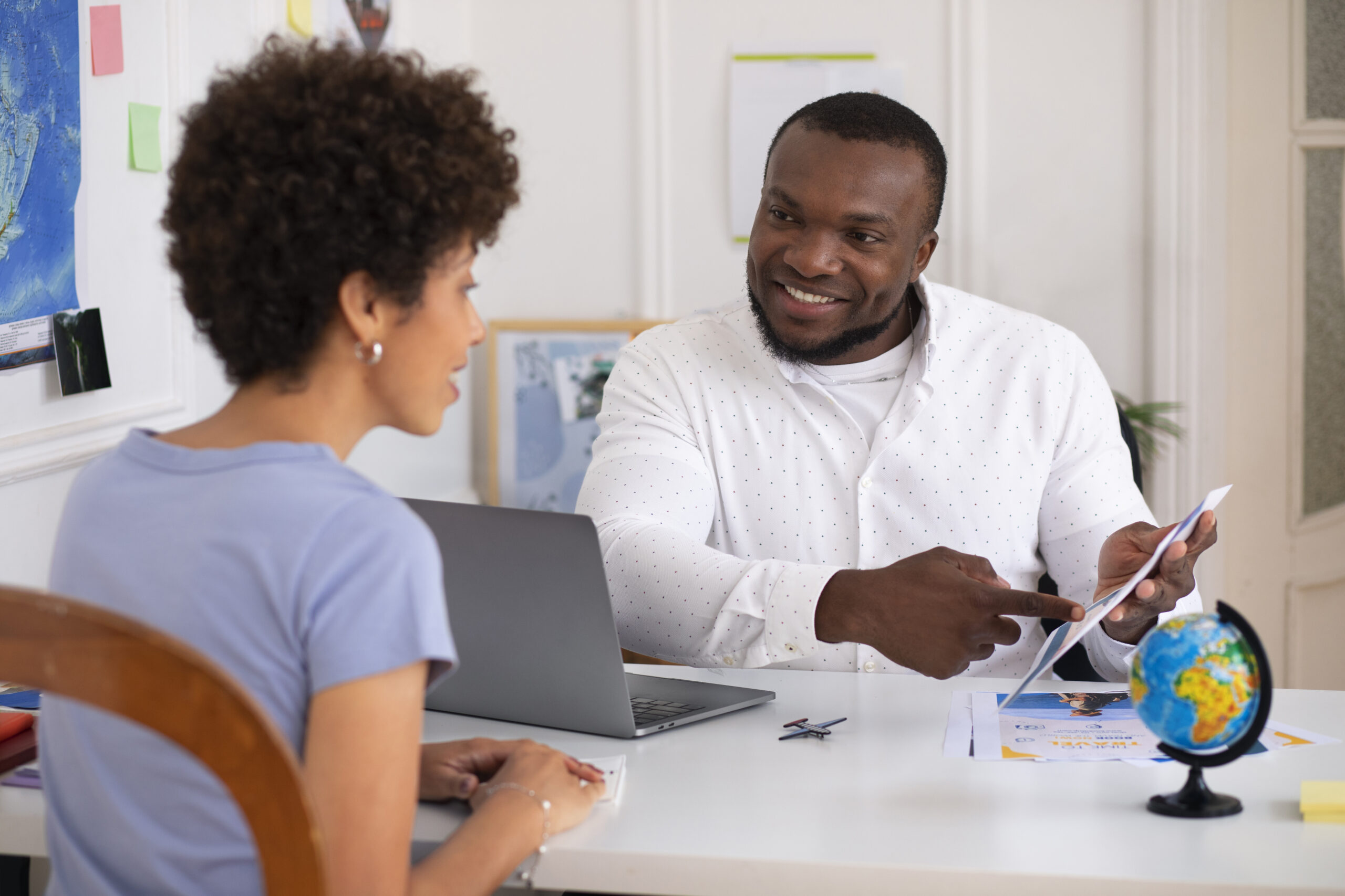 medium-shot-people-travel-agency-office